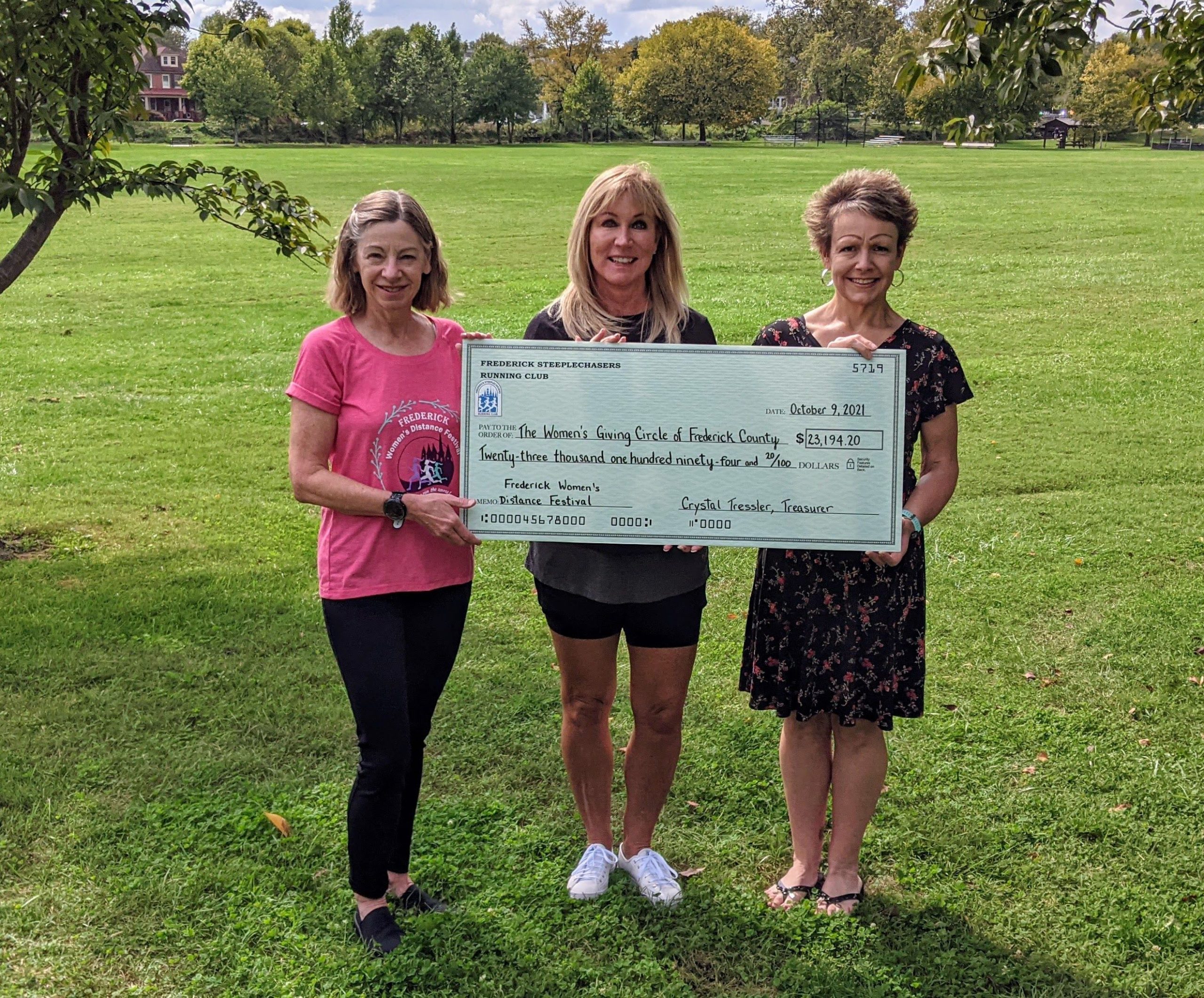 Left to Right, Harriet Langlois, Race Director; Linda Roth, Chair, Women's Giving Circle; Heidi Novak, President, Frederick Steeplechasers Running Club